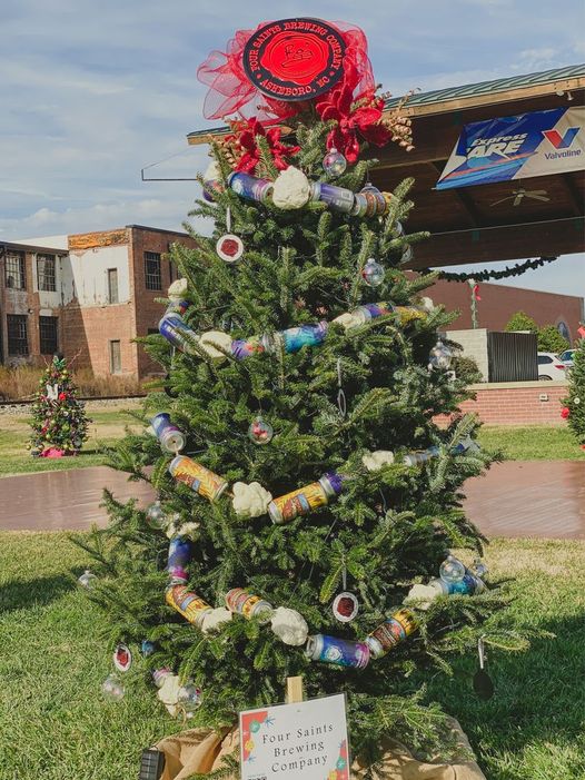 ✨The beer cans were hung on the gifting tree with care! ✨ The first annual Gifti